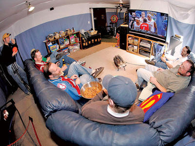 Merriam-Webster's Collegiate Dictionary defines "man cave" as "a room or space (as in a basement) designed according to the taste of the man of the house to be used as his personal area for hobbies and leisure activities ." (Credit:  phillyburbs.com, Levittown, PA)