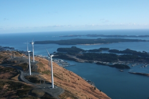 Partially funded through the Alaska Renewable Energy Fund, the Pillar Mountain Wind Farm provides 9 MW of power to the city of Kodiak. Combined with the Terror Lake hydroelectric project, Kodiak's electrical system now runs off about 98% renewable energy. (Credit: Windpower Engineering & Development)