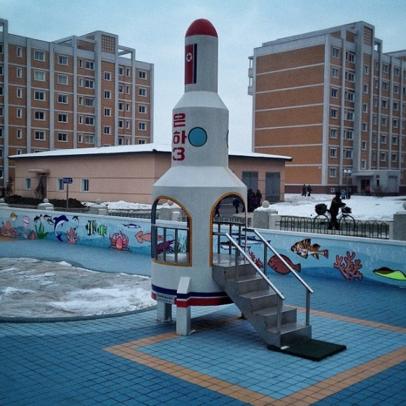 A pre-school playground set, shaped like the North Korean Unha space rocket near the city of Pyongyang. (Credit: David Guttenfelder via Instagram)