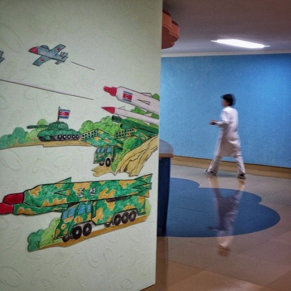 Weapons are painted on the walls of a recently built pediatric hospital in Pyongyang, North Korea. (Credit: David Guttenfelder via Instagram)