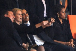 President Obama takes a selfie with British Prime Minister David Cameron and Denmark's Prime Minister Helle Thorning Schmidt. (Credit: Getty Images)